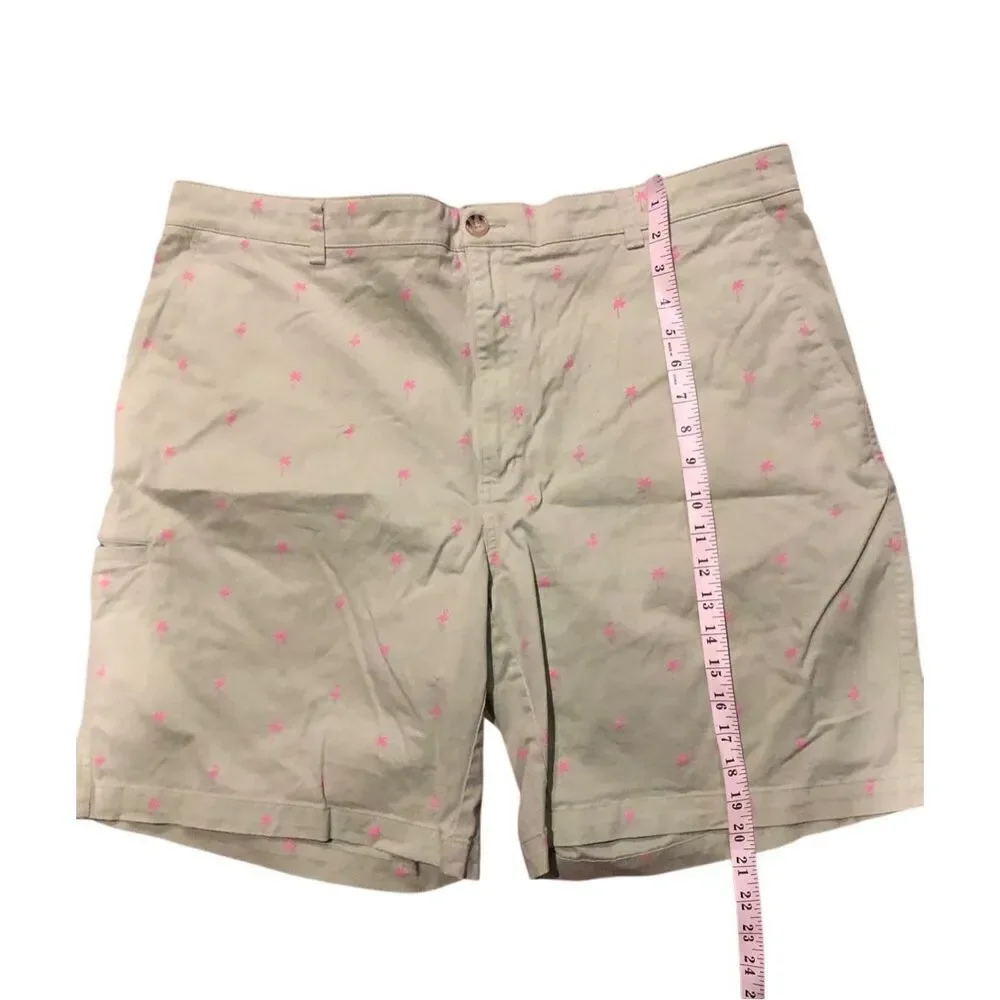 Tackle & Tides light green cotton twill shorts with pink palm trees and flamingo